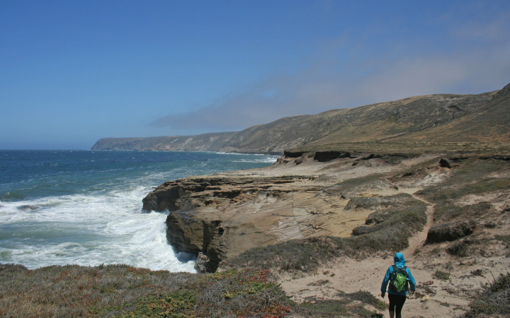 Exploring the coastal cliffs of Santa Rosa Island. (Levi Gadye)